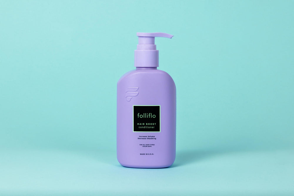 Folliflo Hair Boost Conditioner in use during shower for daily care.