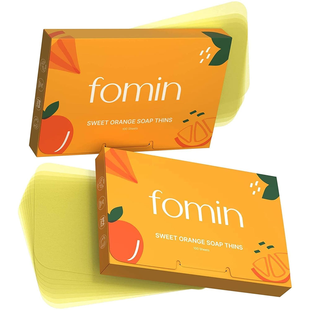 FOMIN orange packaging for antibacterial paper soap sheets, ideal for travel.