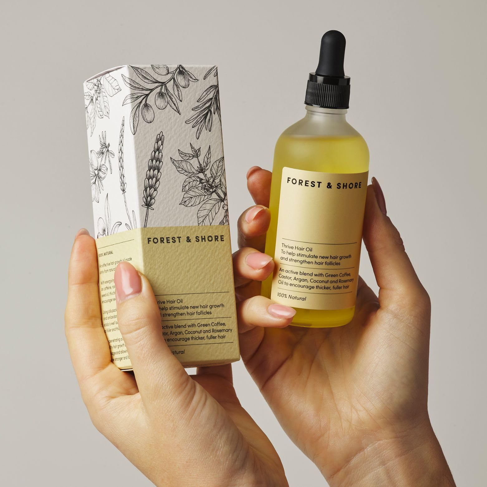Forest & Shore hair strands with natural shine after using the oil.