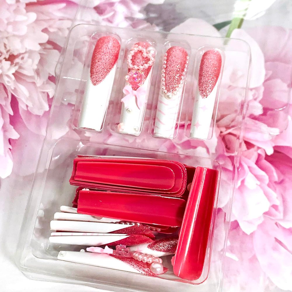 FOXIIU mini file, stick, and adhesive tabs for easy at-home styling.