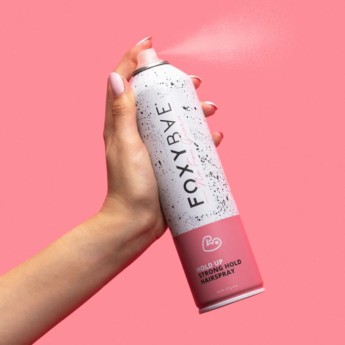 FoxyBae hair spray applied to wet hair to boost waves