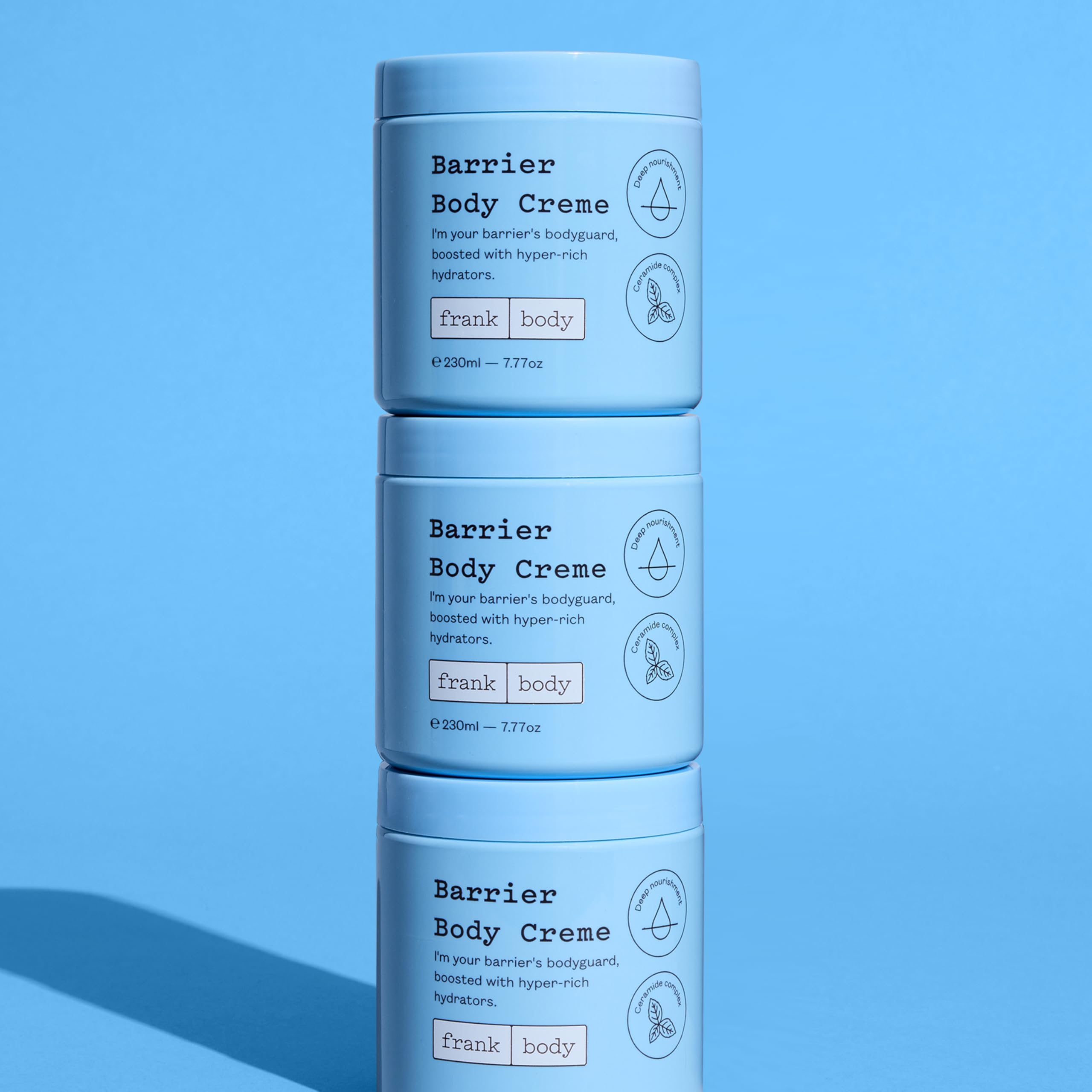 frank body Barrier Body Cream packaging featuring peach notes and comfort
