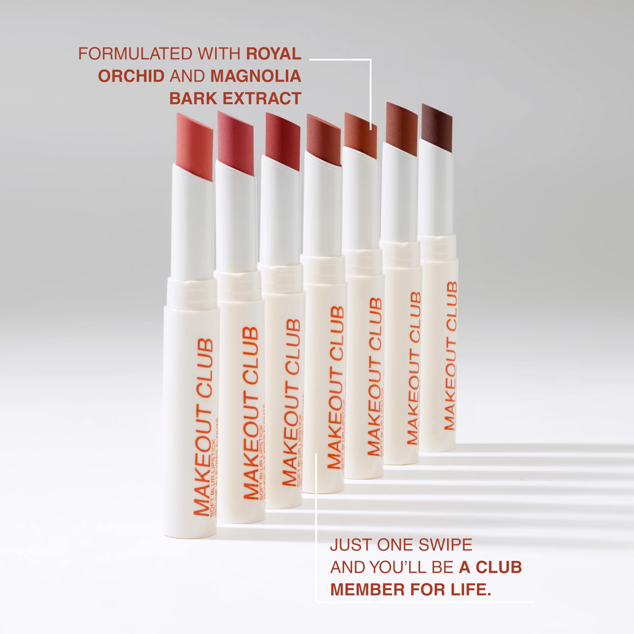 Lip swatch of Freck Beauty MAKEOUT CLUB in dark brown showing buildable coverage.