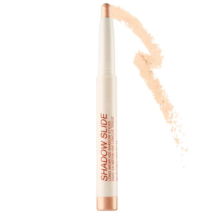 Freck Beauty Shadow Slide warm champagne stick closeup shows vibrant color and smooth glide.