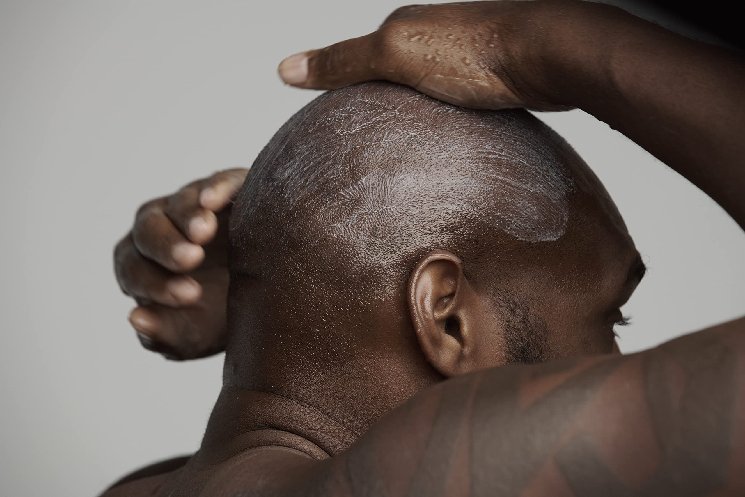 Frederick Benjamin gel on skin glide indicates reduced friction for a smoother shave.