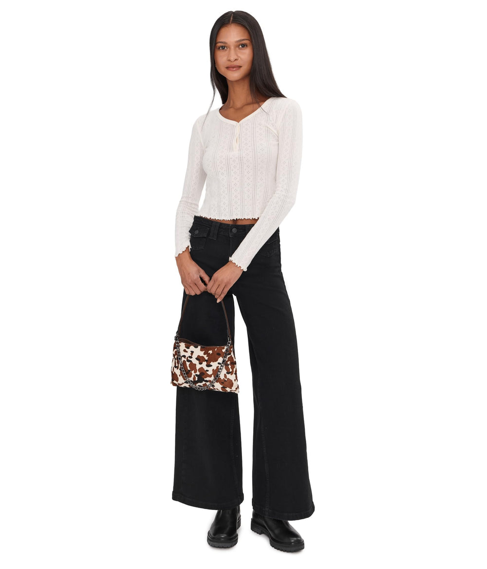 Free People Kellee High-Rise Palazzo side view showing fluid drape for easy movement.