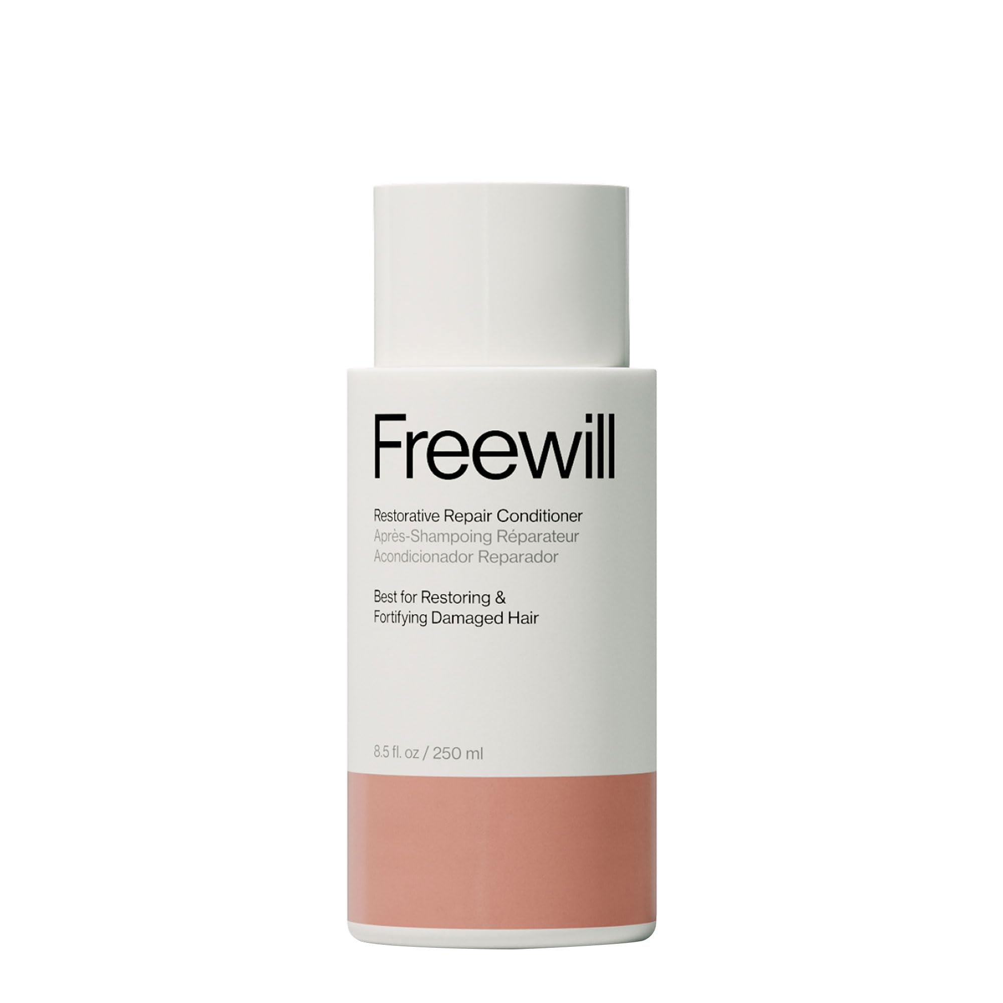 Freewill Restorative Repair Conditioner bottle pour shows hydrating formula for damaged hair.