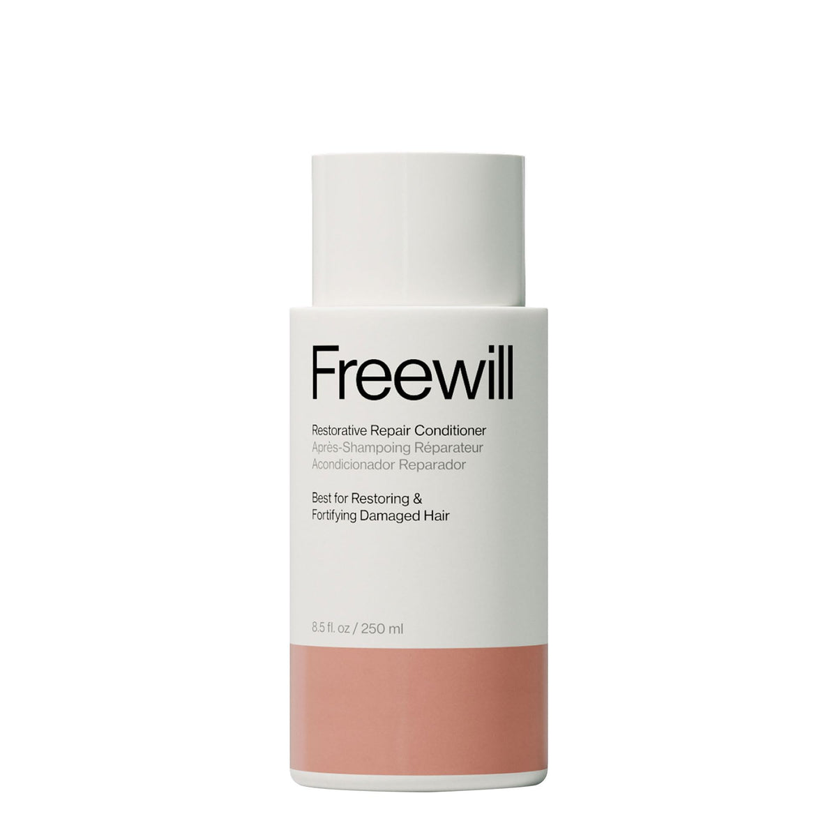 Freewill Restorative Repair Conditioner bottle pour shows hydrating formula for damaged hair.