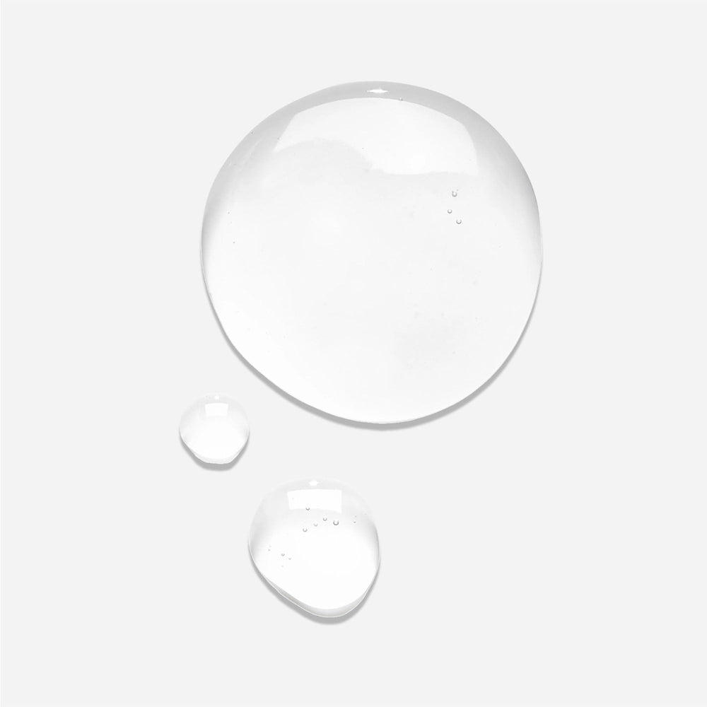 Freewill coconut oil ingredient shot highlights natural moisture for scalp