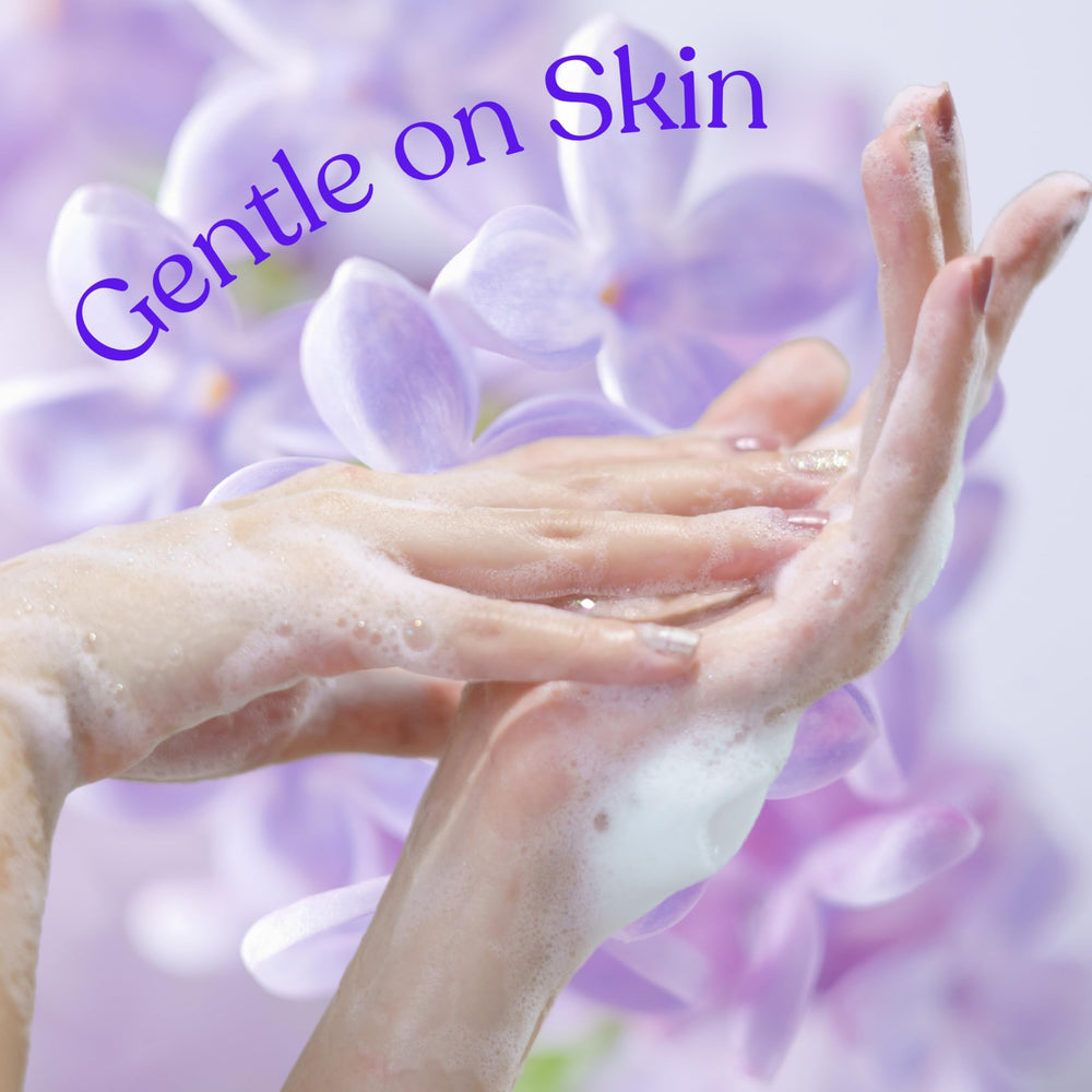 Fresh Cut Lilacs foam closeup emphasizes airy, gentle cleansing feel.