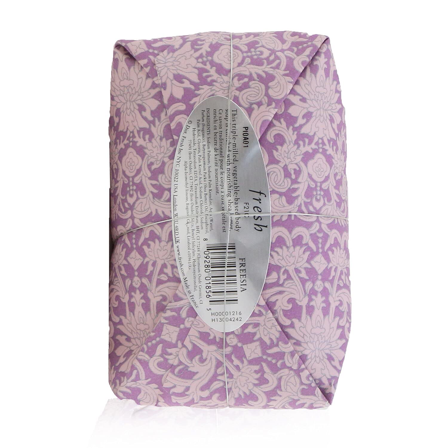 Fresh Freesia Soap wrap detail highlights artisanal craft and stone accent