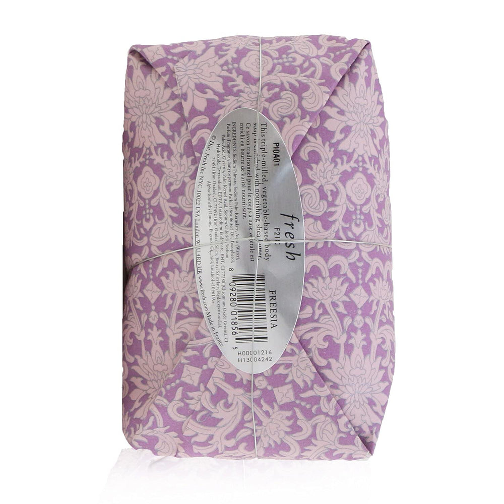 Fresh Freesia Soap wrap detail highlights artisanal craft and stone accent