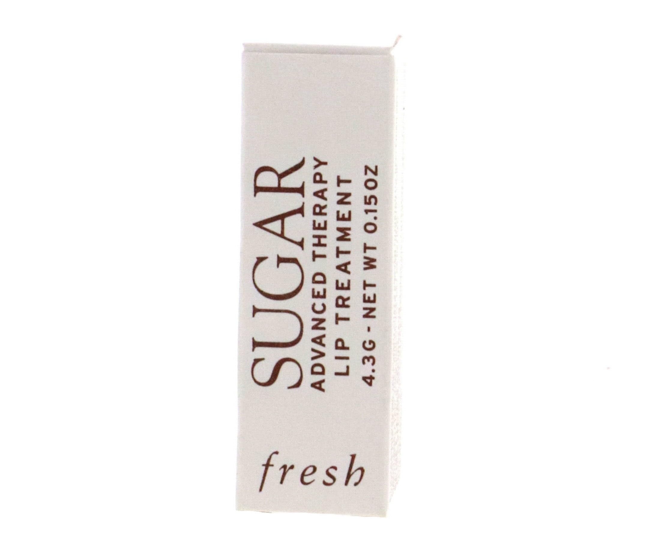 Applying Fresh Sugar Advanced Therapy lip treatment for a smooth, hydrated feel