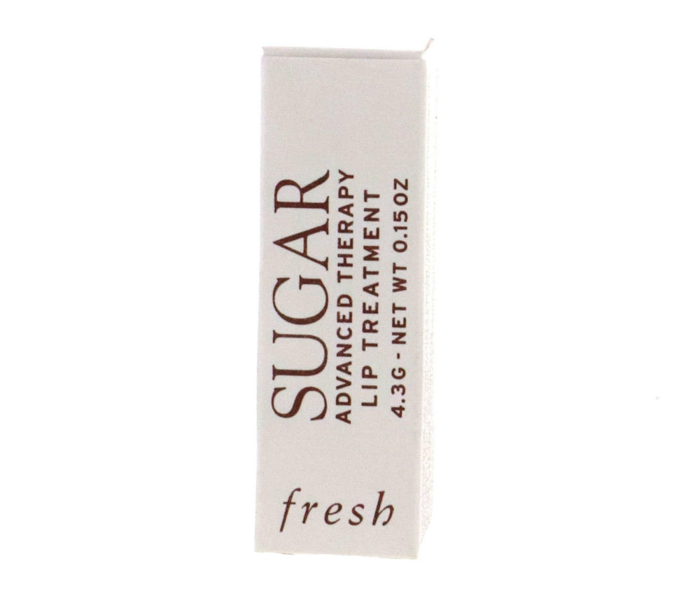 Applying Fresh Sugar Advanced Therapy lip treatment for a smooth, hydrated feel