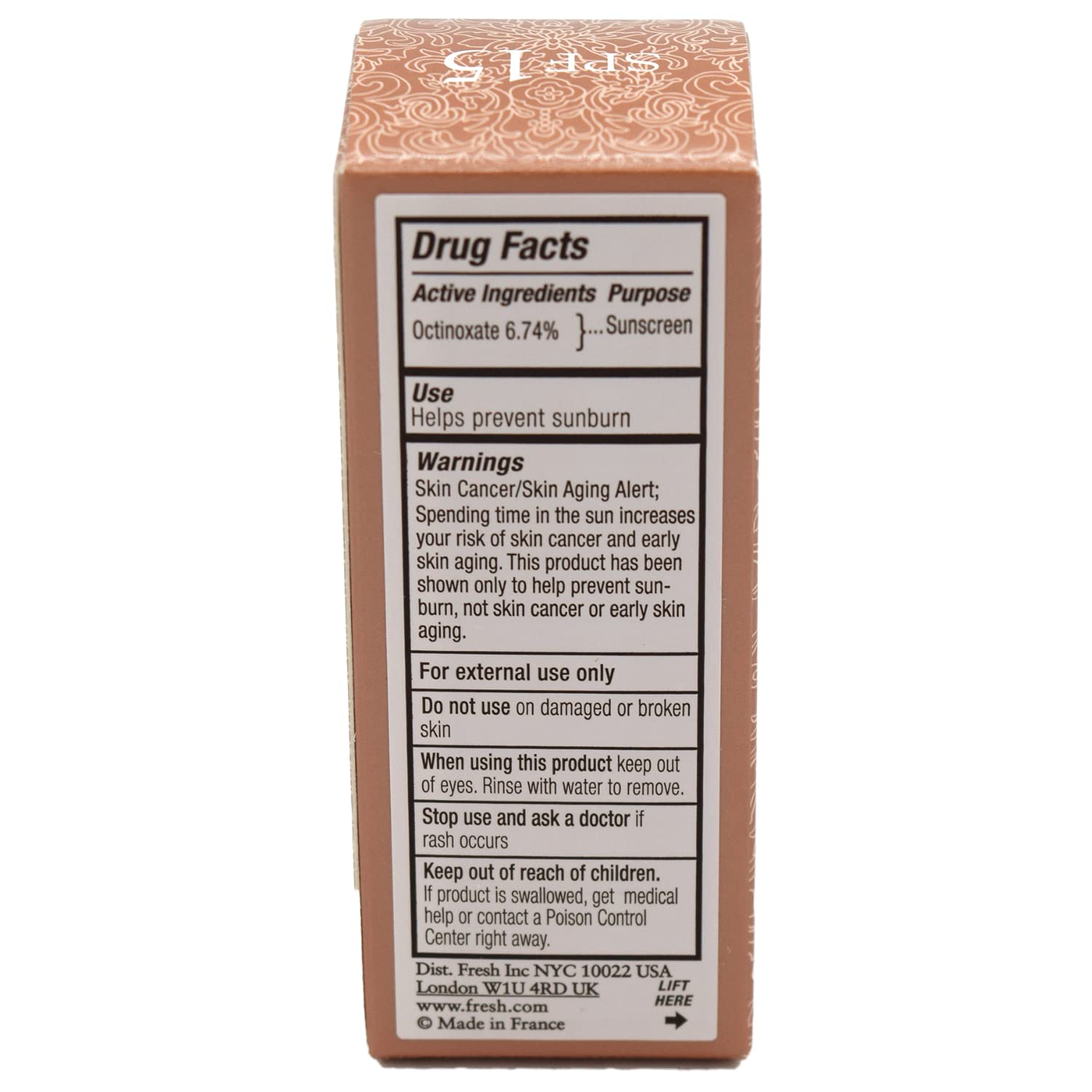 Fresh Sugar Honey Tinted Lip Treatment applicator on lips illustrates everyday wear.