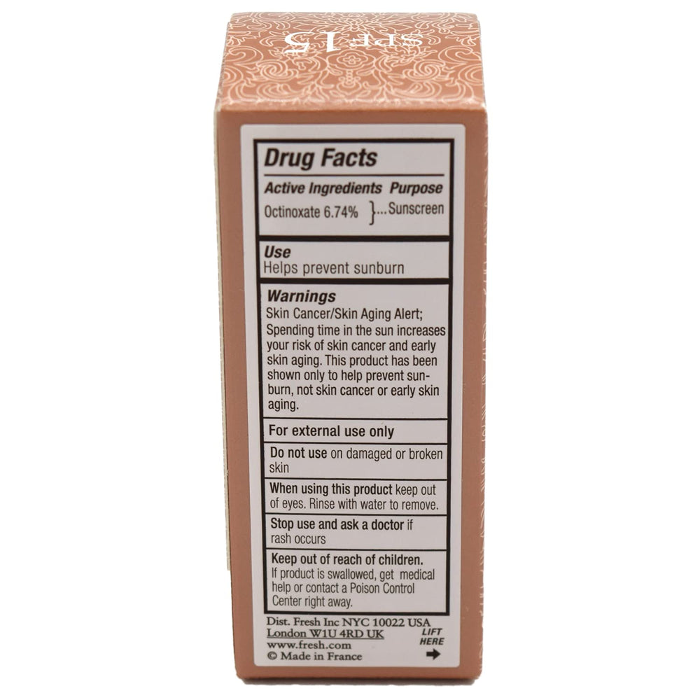 Fresh Sugar Honey Tinted Lip Treatment applicator on lips illustrates everyday wear.