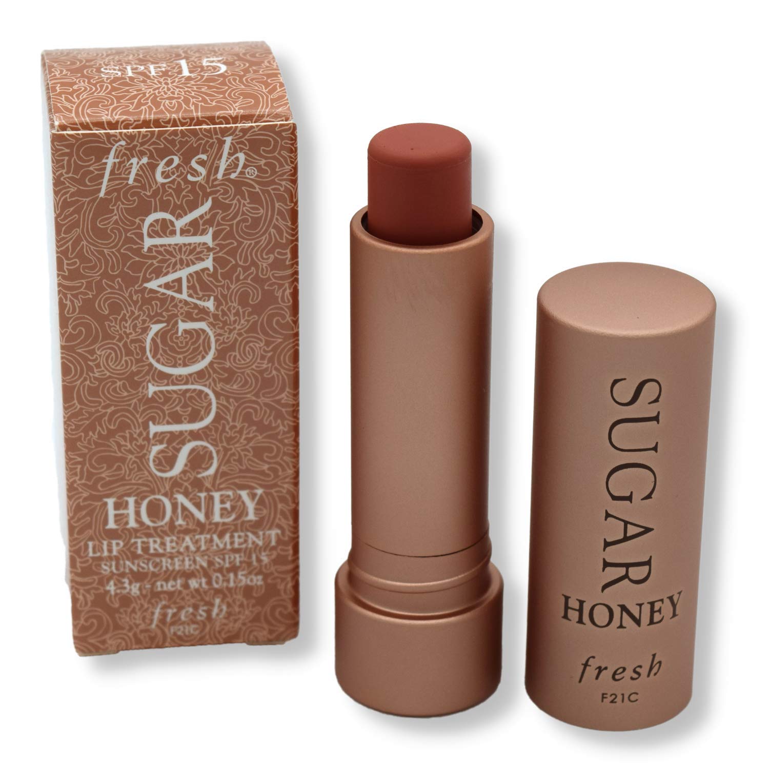 Fresh Sugar Honey Tinted Lip Treatment tube with swatch shows buildable color.