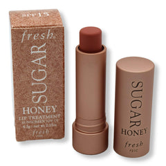 Fresh Sugar Honey Tinted Lip Treatment tube with swatch shows buildable color.