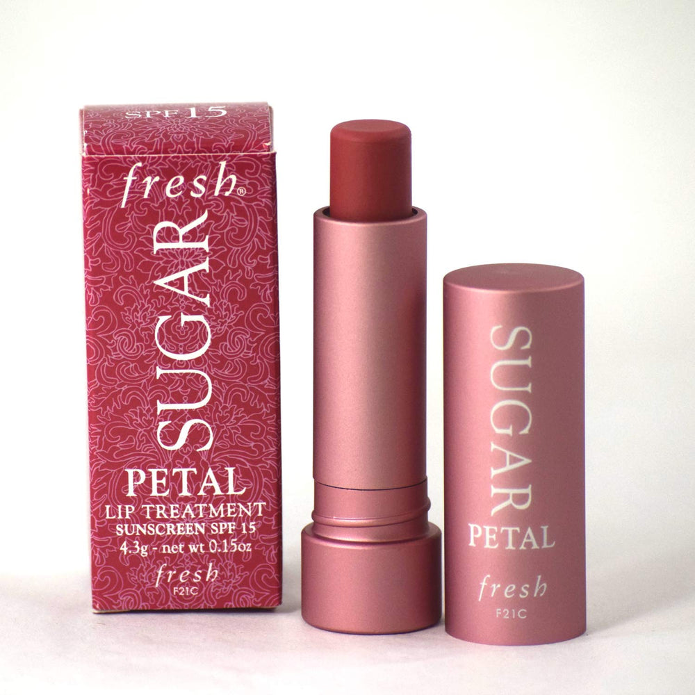 Fresh Sugar Lip Treatment SPF 15 closeup highlights nourishing oils.