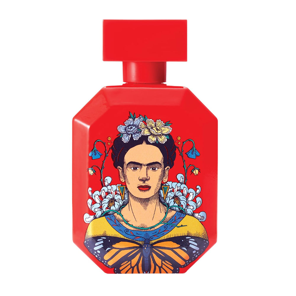 Frida Kahlo Red bottle on a surface highlights warm cedarwood and vanilla base notes.