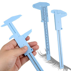 Frienda double-scale ruler held for quick inch and cm readings