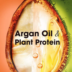 Fructis Sleek & Shine conditioner label front highlights color protection and hydration.