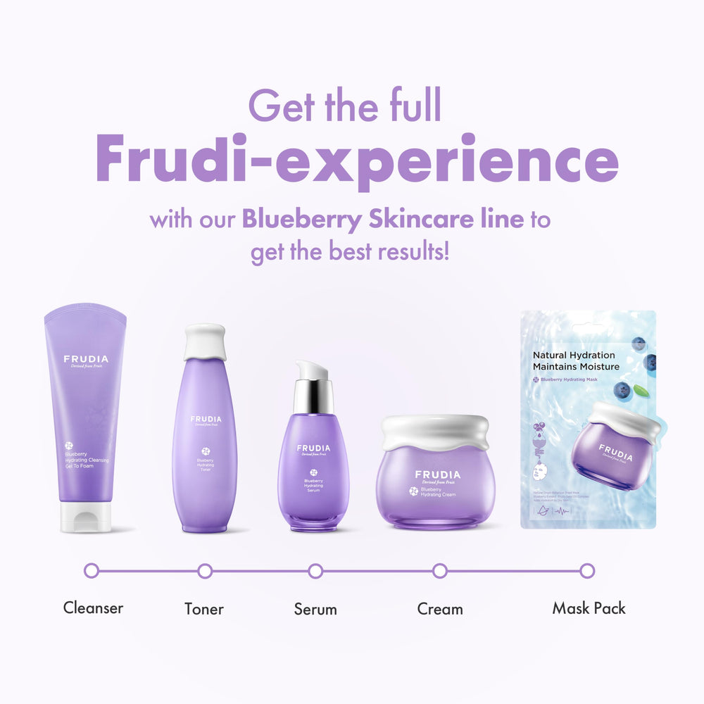 FRUDIA Blueberry Hydrating Serum sits on a clean vanity for daily skincare.