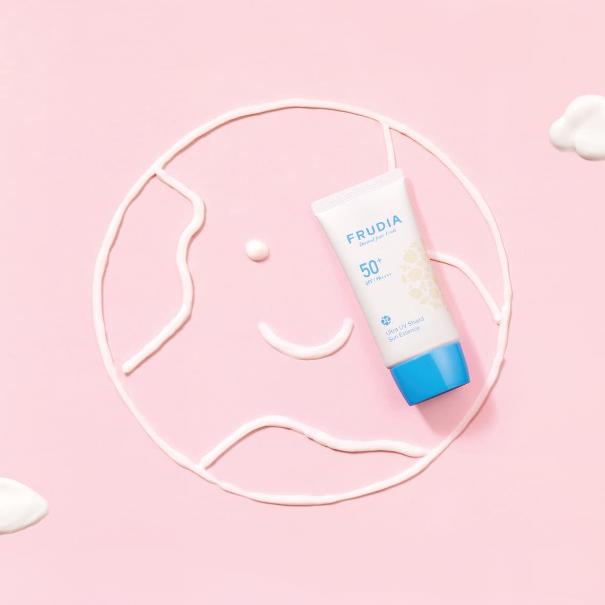 FRUDIA Welcos Sun Block Day Cream Essence on hand demonstrates quick, even blending for natural look.
