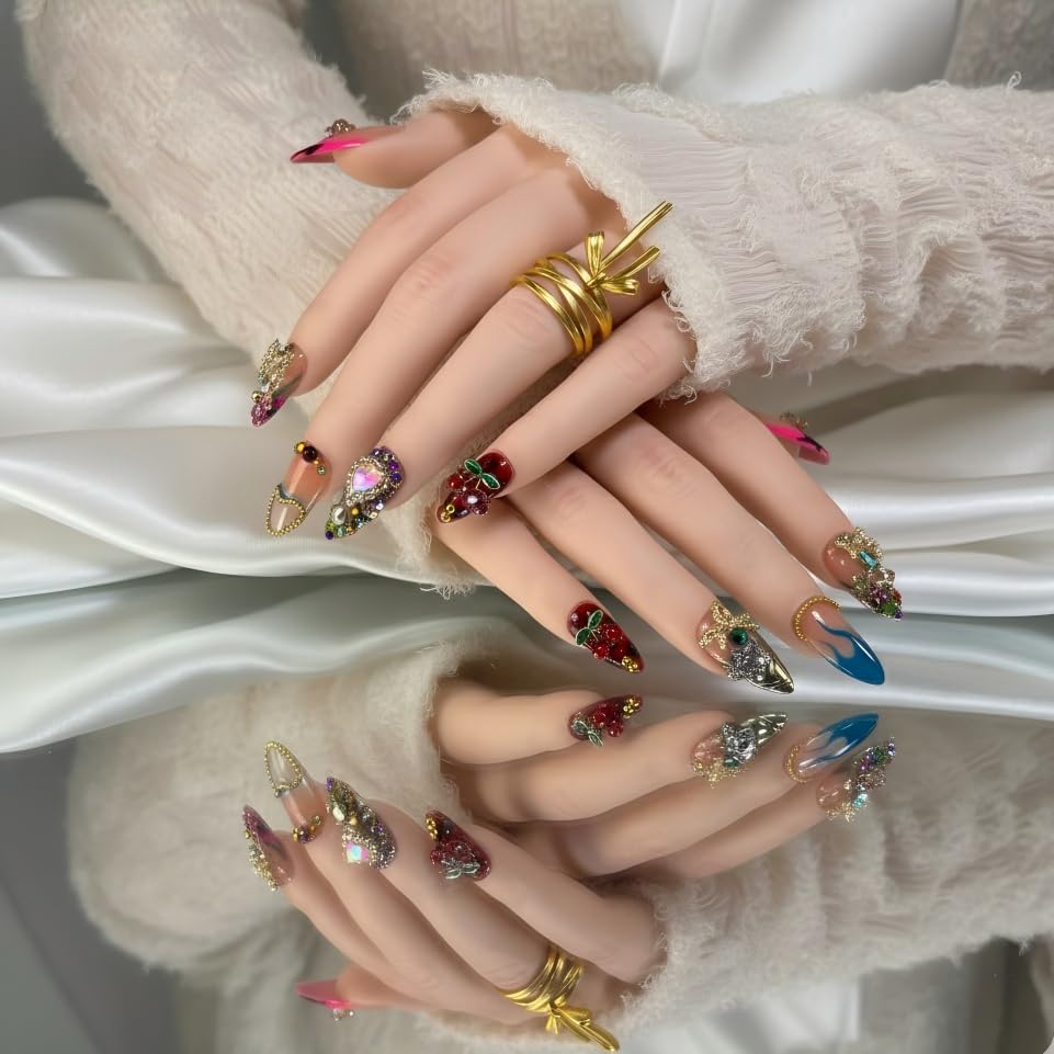 FURNUNUBI almond nails featuring flames and cherry motifs for bold, trendy flair.