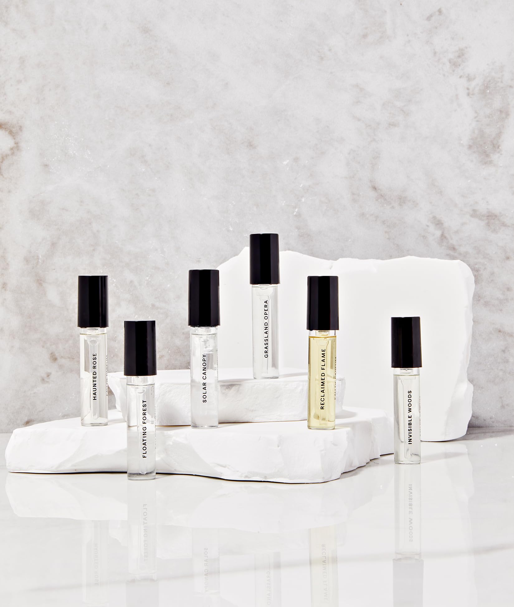Future Society Invisible Woods mini bottle, luminous woody profile for evening wear.