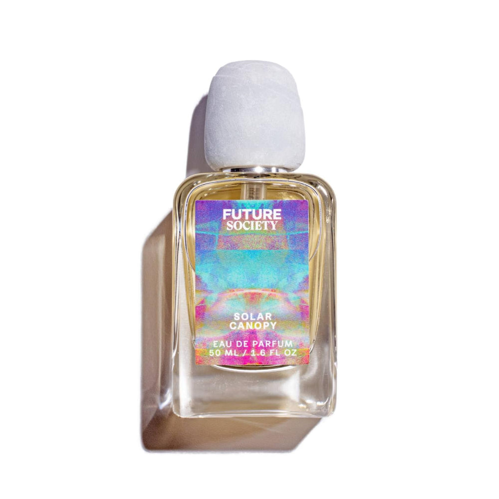 Future Society Solar Canopy premium cap and bottle on reflective surface for elegance.
