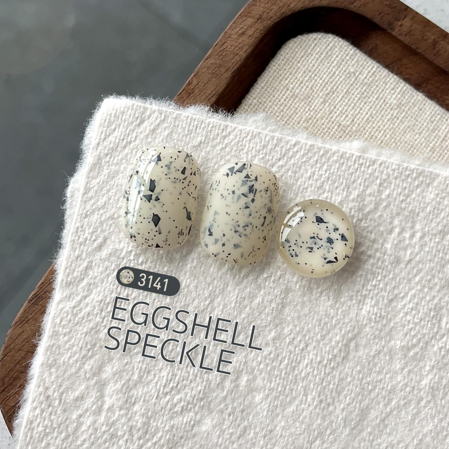 GAOY eggshell speckle base – beige-white finish for subtle looks.