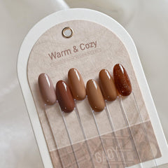 GAOY Hazelnut Chocolate gel nail polish bottle close-up to emphasize texture and color depth.