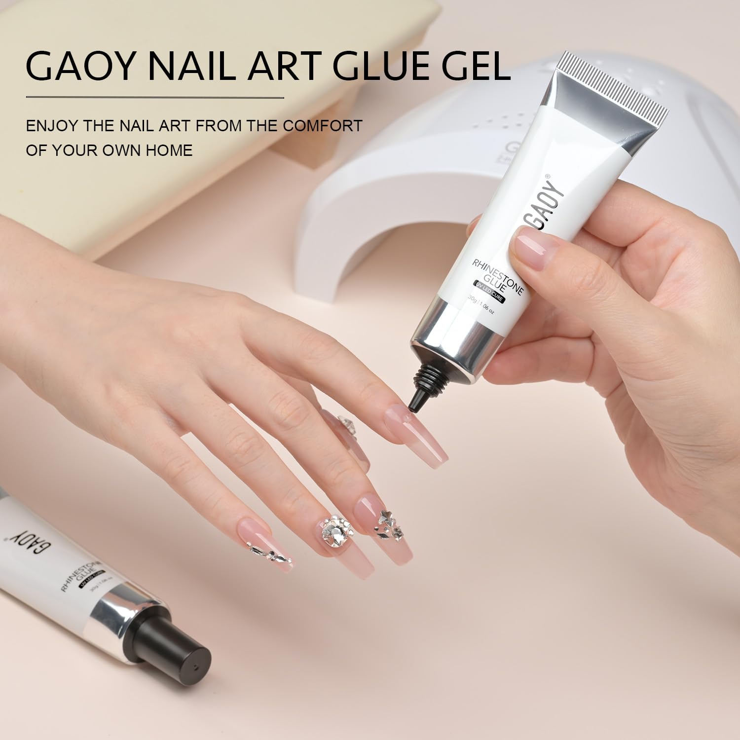 GAOY Rhinestone Glue holds decorations up to four weeks on nails.