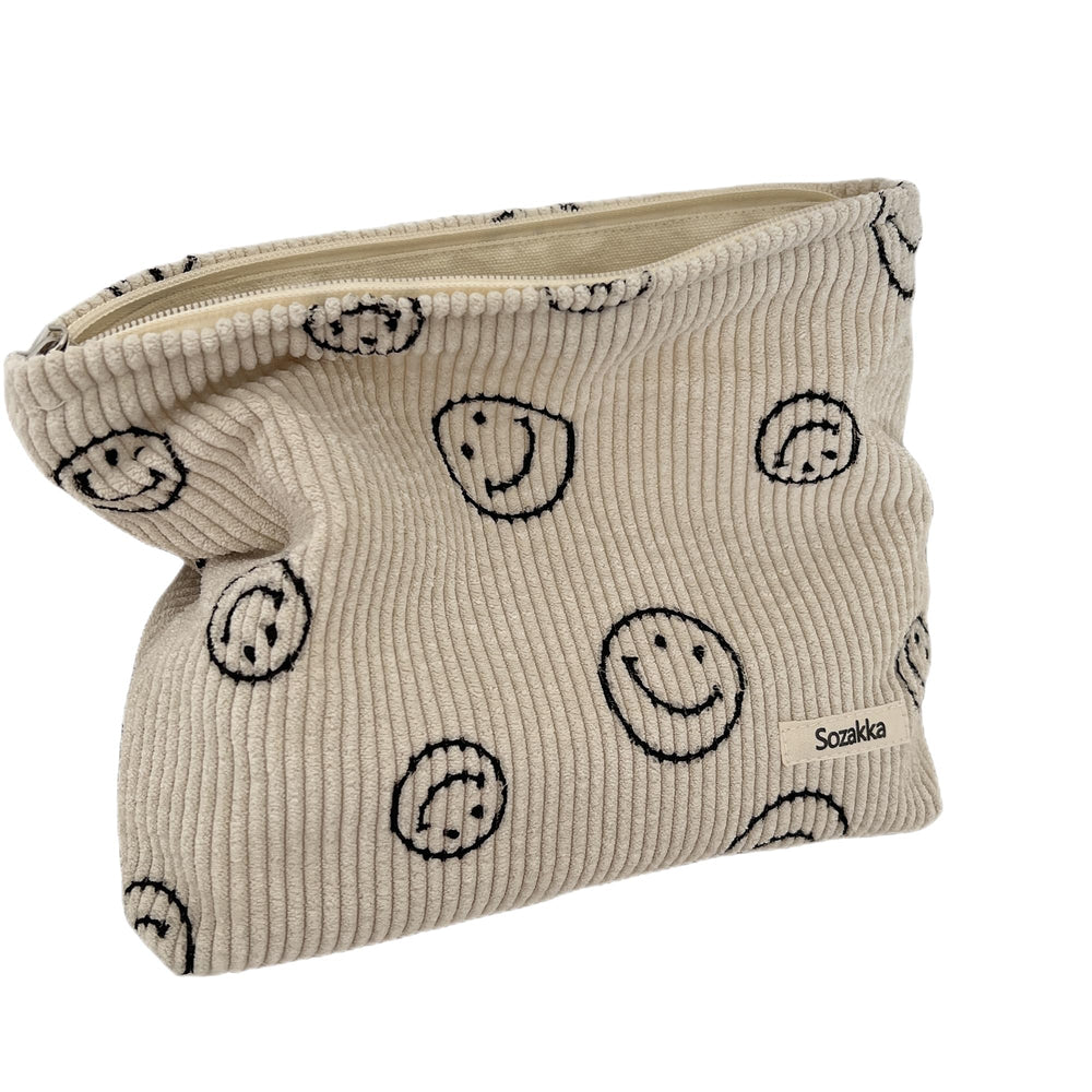 Gardsell corduroy cosmetic bag with smiley dots for stylish makeup storage on the go.