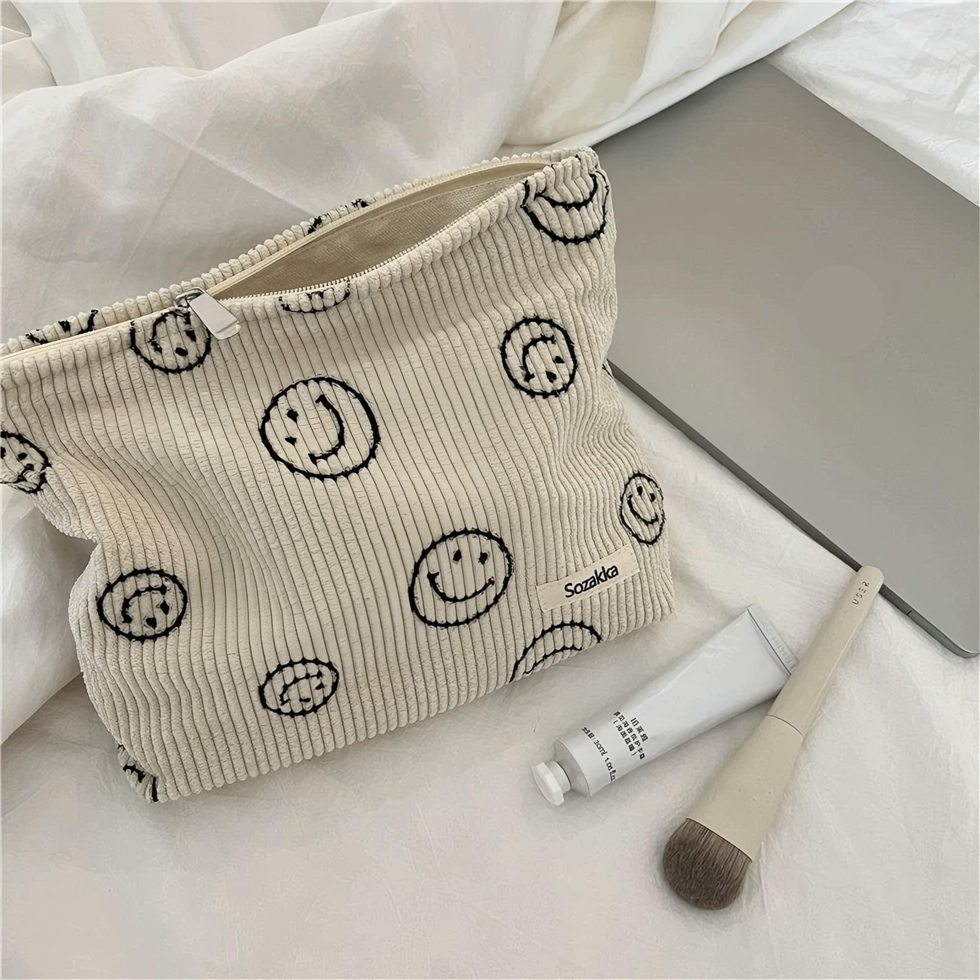 Gardsell corduroy cosmetic bag with soft zipper keeps items secure during travel.