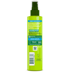 Garnier Fructis Pure Moisture bottle pour demonstrates easy application for long-lasting moisture.