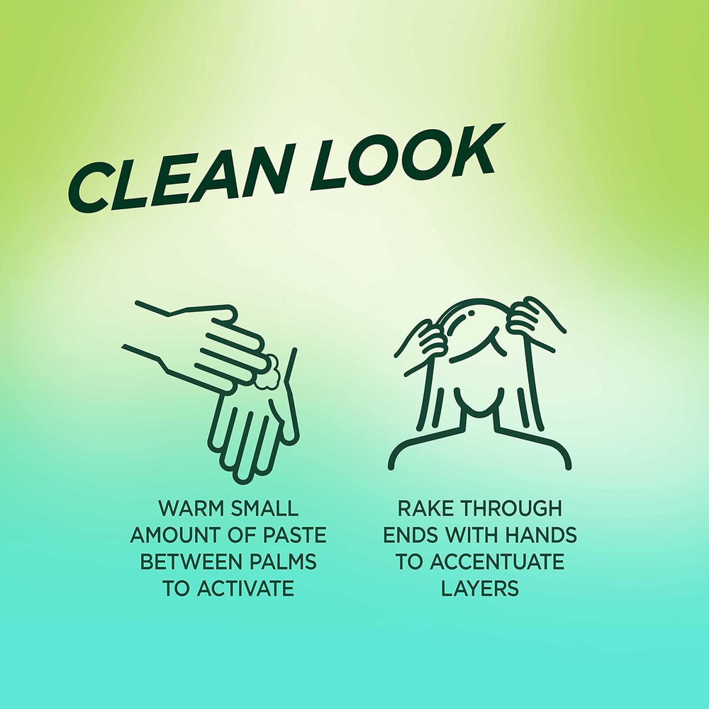 Hand holding Garnier Fructis Style Pure Clean Finishing Paste sample for control.
