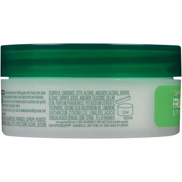 Model hair styled with Garnier Fructis Style Pure Clean Finishing Paste for flexible shaping.