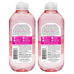 Garnier Micellar Water with Rose and a cotton pad removing makeup.