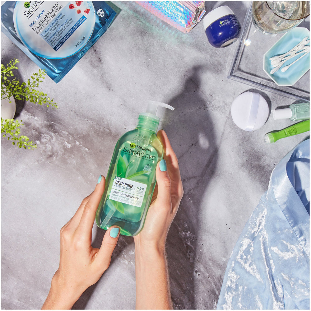 Rinsing Garnier SkinActive face wash showing clean, residue-free finish