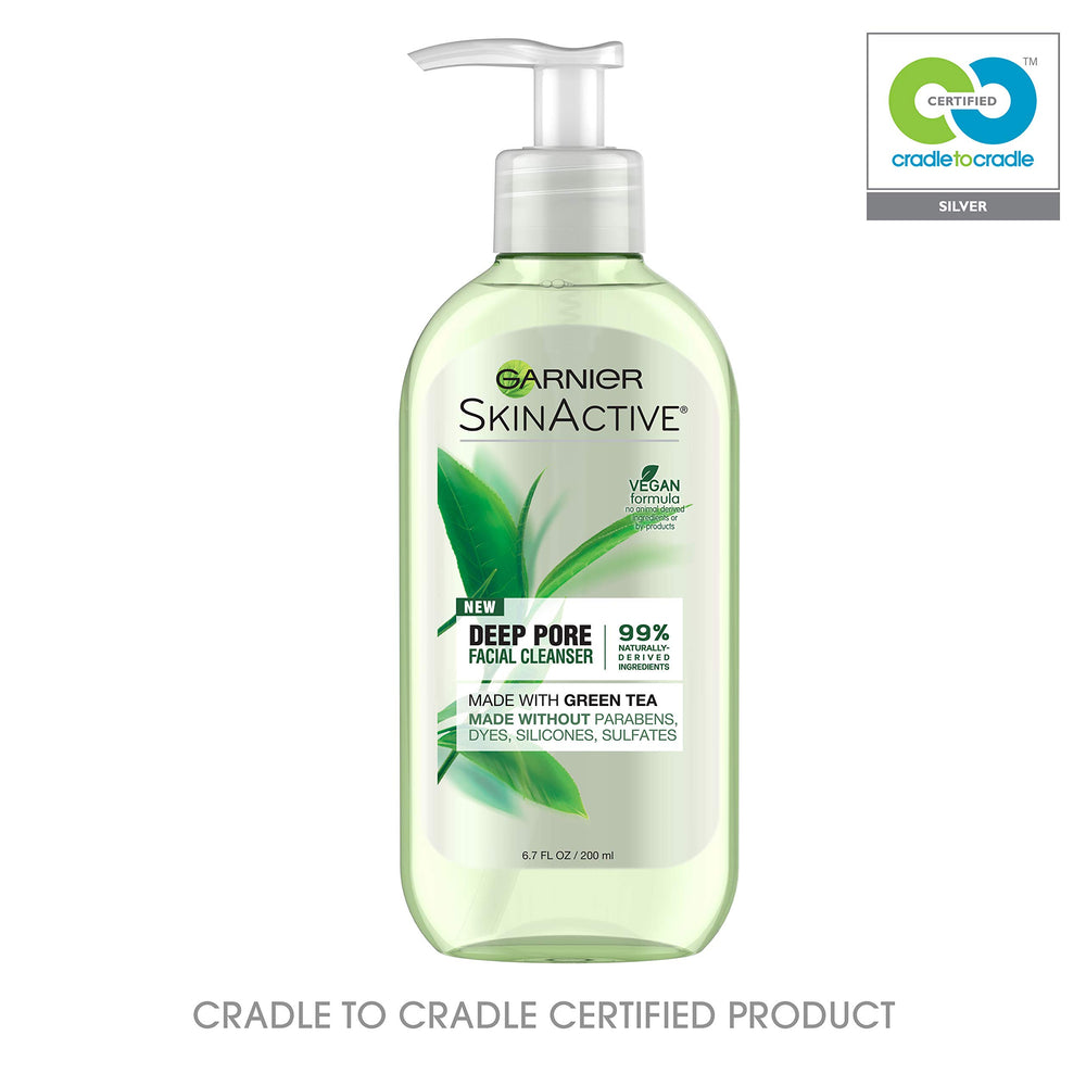 Garnier SkinActive green tea bottle displayed on a bathroom shelf