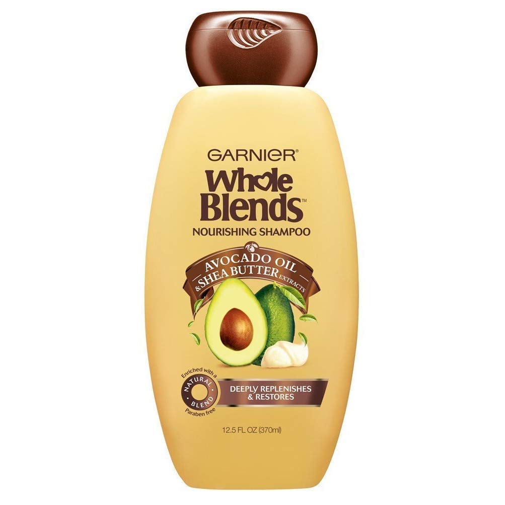 Garnier Whole Blends avocado oil shampoo bottle for daily moisturization