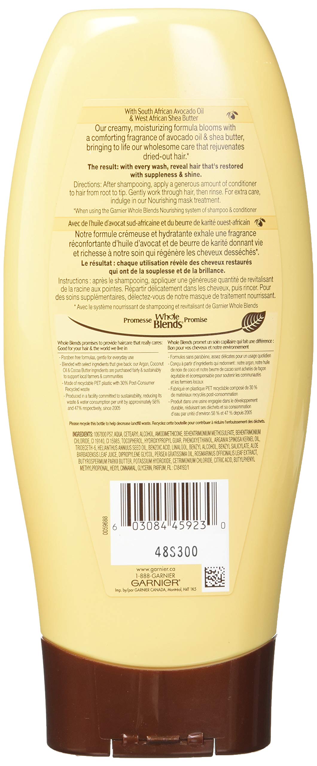 Garnier Whole Blends bottle with natural ingredients symbolizing gentle care