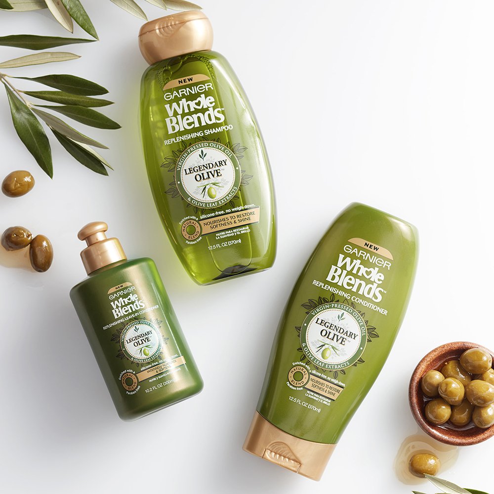 Garnier Whole Blends Legendary Olive label close-up highlights silicone-free, paraben-free formula.