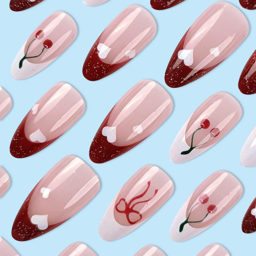 GCSQW Nails on hand showcase chic bow design for a flirty look.