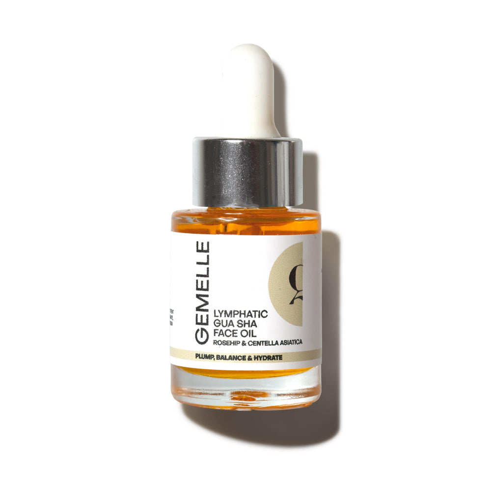 GEMELLE Lymphatic Gua Sha Face Oil bottle for smooth glide and daily hydration.