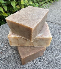 GemTii turmeric nettle soap bar closeup showing earthy warmth for nourishing skin.