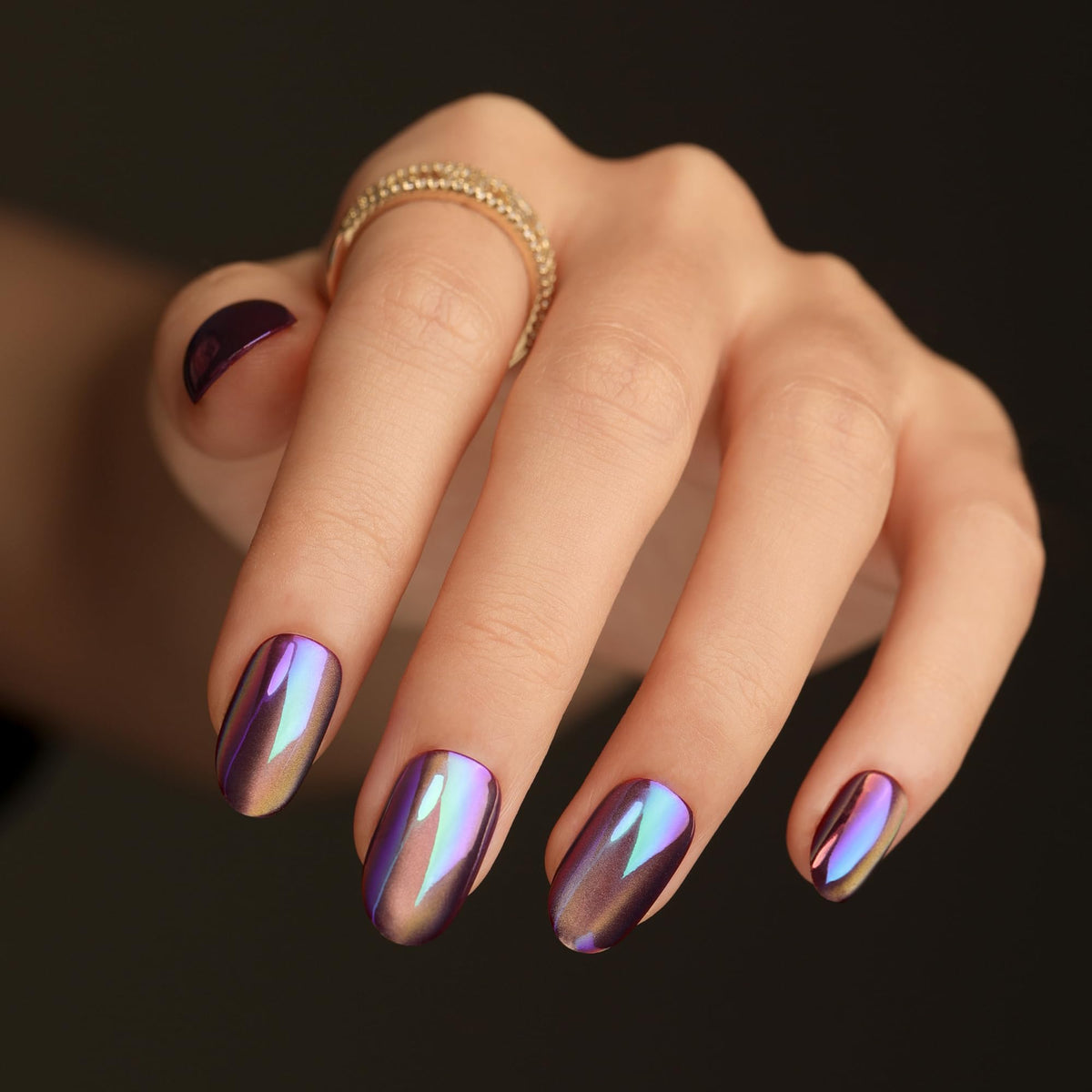 Generic press-on nails, short almond shape with bright purple electroplated finish for instant glam