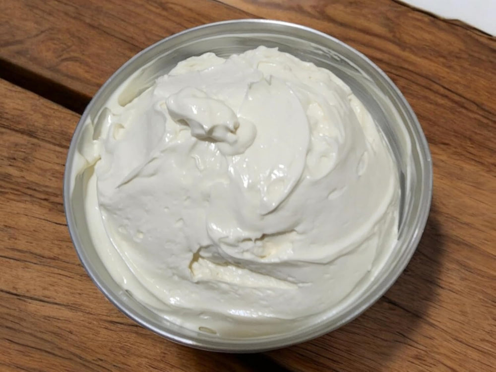 Generic Tallow & Magnesium Body Butter texture being massaged into skin for moisture